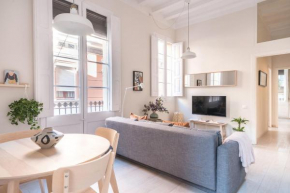 Light, cozy terrace and local life in Gracia